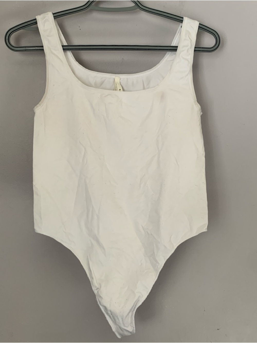Babaton White Woman’s One-Piece Bodysuit with Scoop Neck Medium